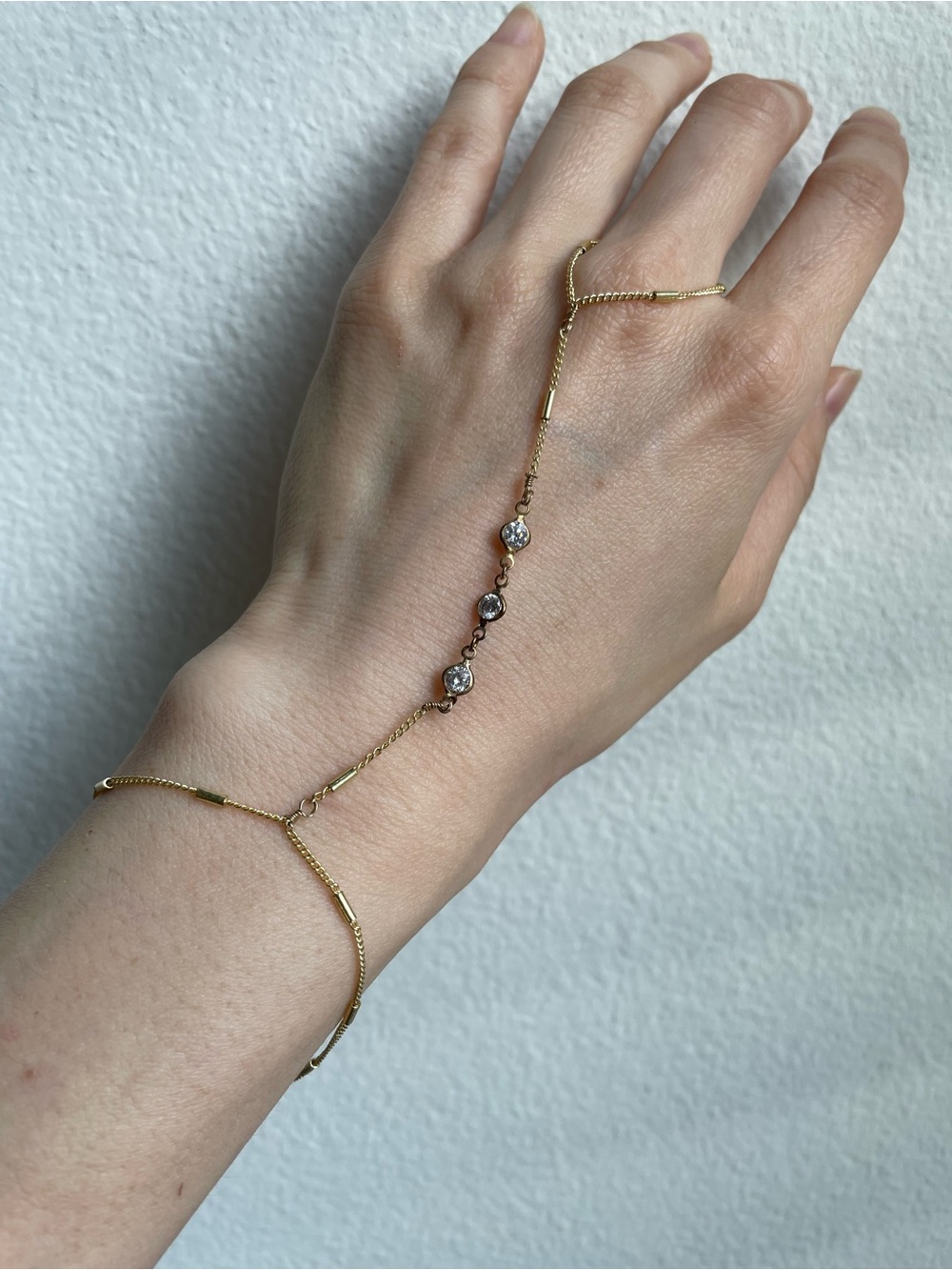 Hand chain bracelet